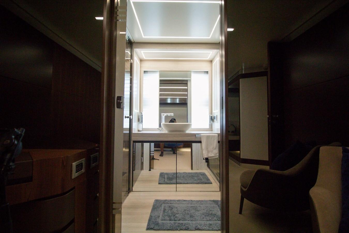 a room with a table and chairs aboard SEDA Yacht for Sale