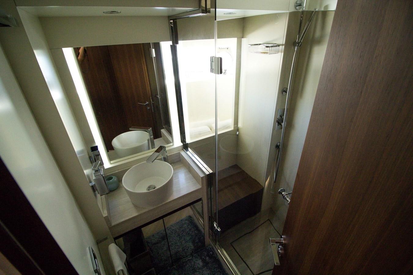 a bathroom with a sink and a mirror aboard SEDA Yacht for Sale