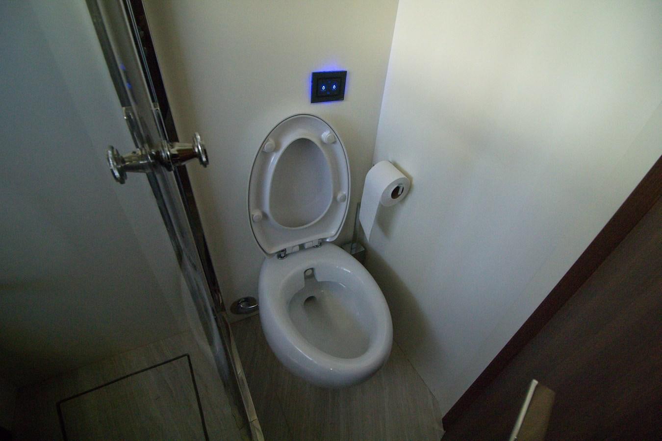 a toilet in a bathroom aboard SEDA Yacht for Sale
