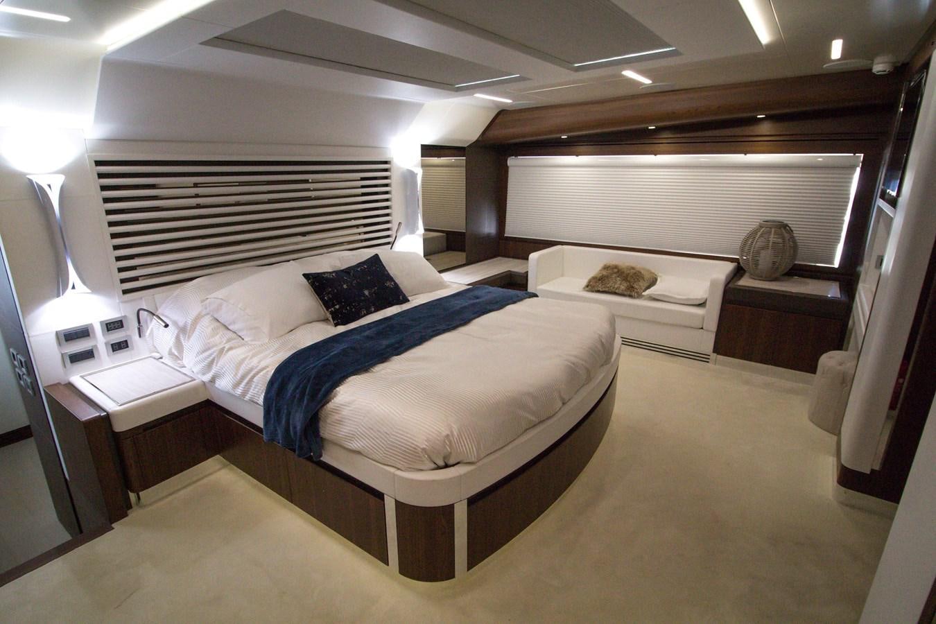 a room with a bed and a desk aboard SEDA Yacht for Sale