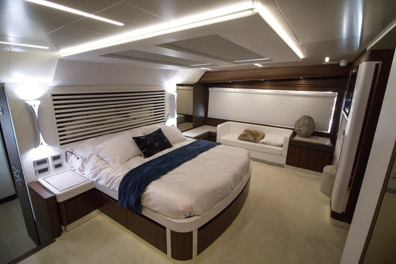 a room with a bed and a desk aboard SEDA Yacht for Sale