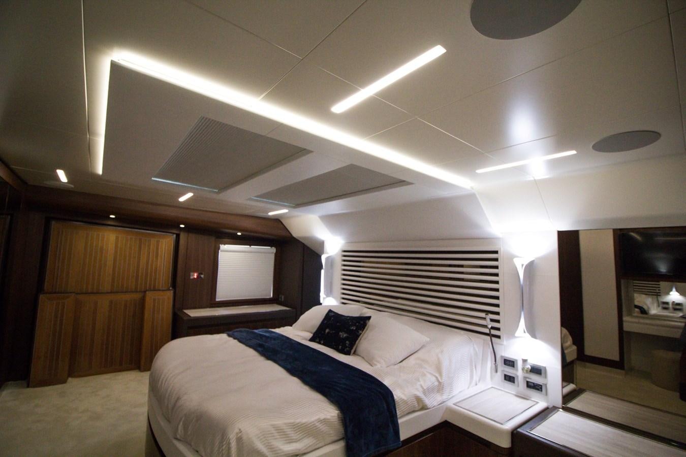 a room with a bed and a desk aboard SEDA Yacht for Sale