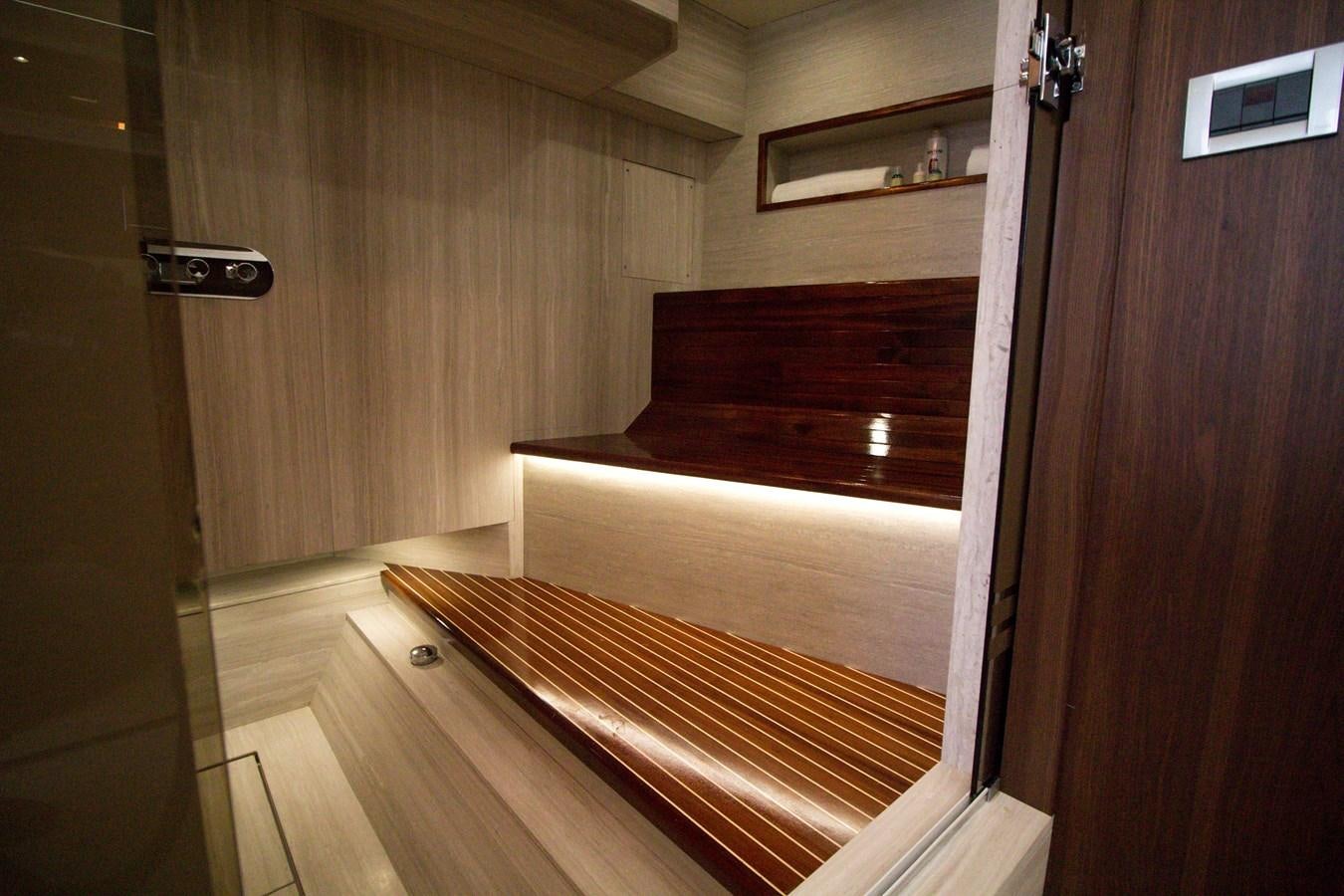 a room with a wood floor and a wood door aboard SEDA Yacht for Sale