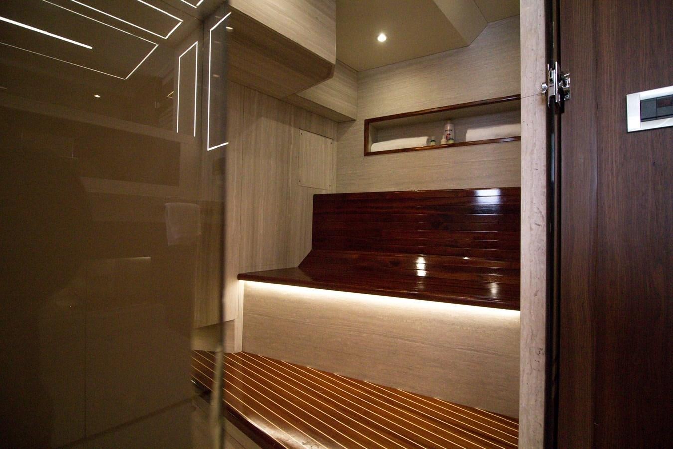 a room with wooden stairs aboard SEDA Yacht for Sale