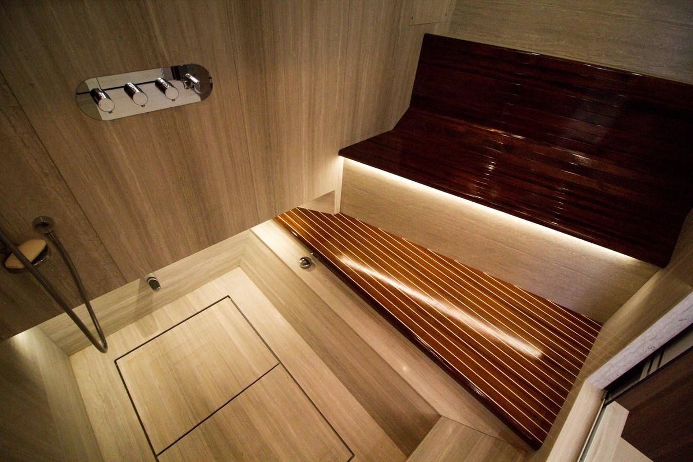 a wood floor with a wood railing aboard SEDA Yacht for Sale