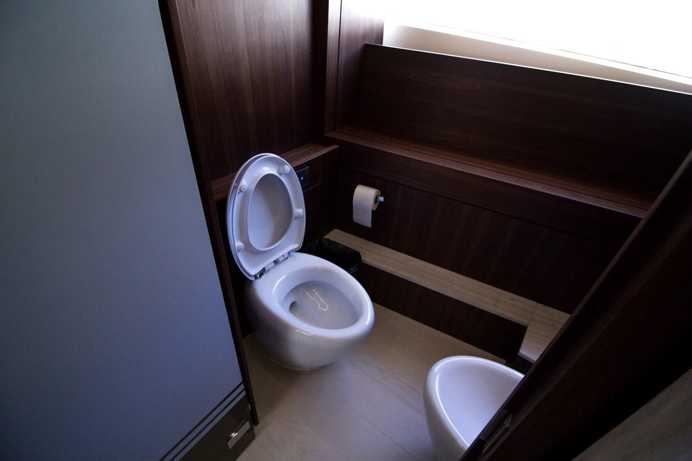 a toilet in a bathroom aboard SEDA Yacht for Sale
