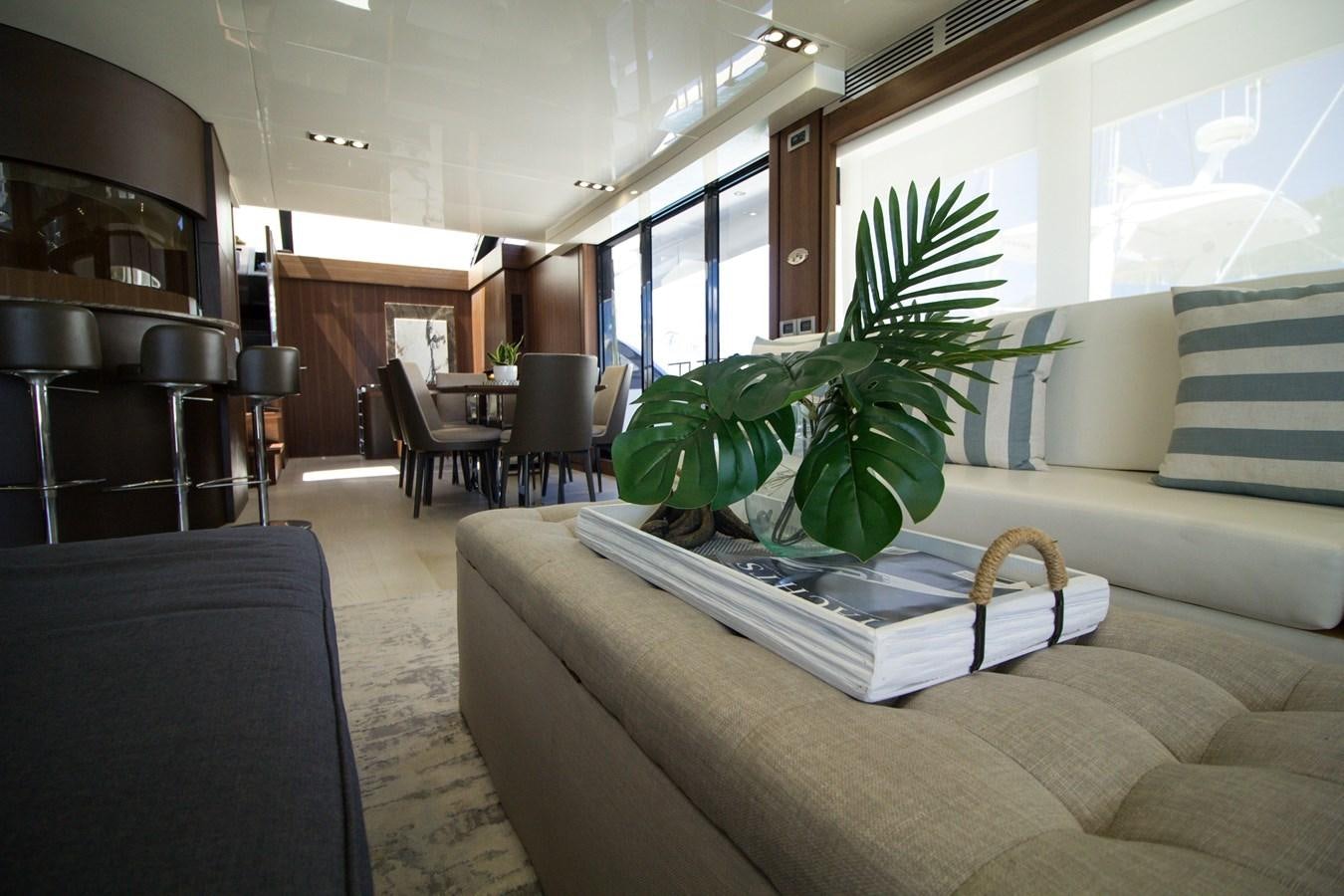 a living room with a plant on the couch aboard SEDA Yacht for Sale