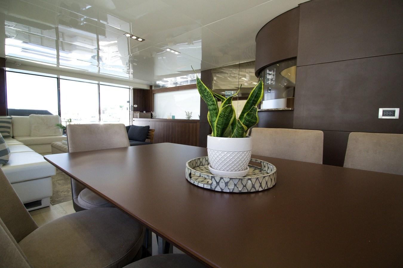 a potted plant on a table aboard SEDA Yacht for Sale