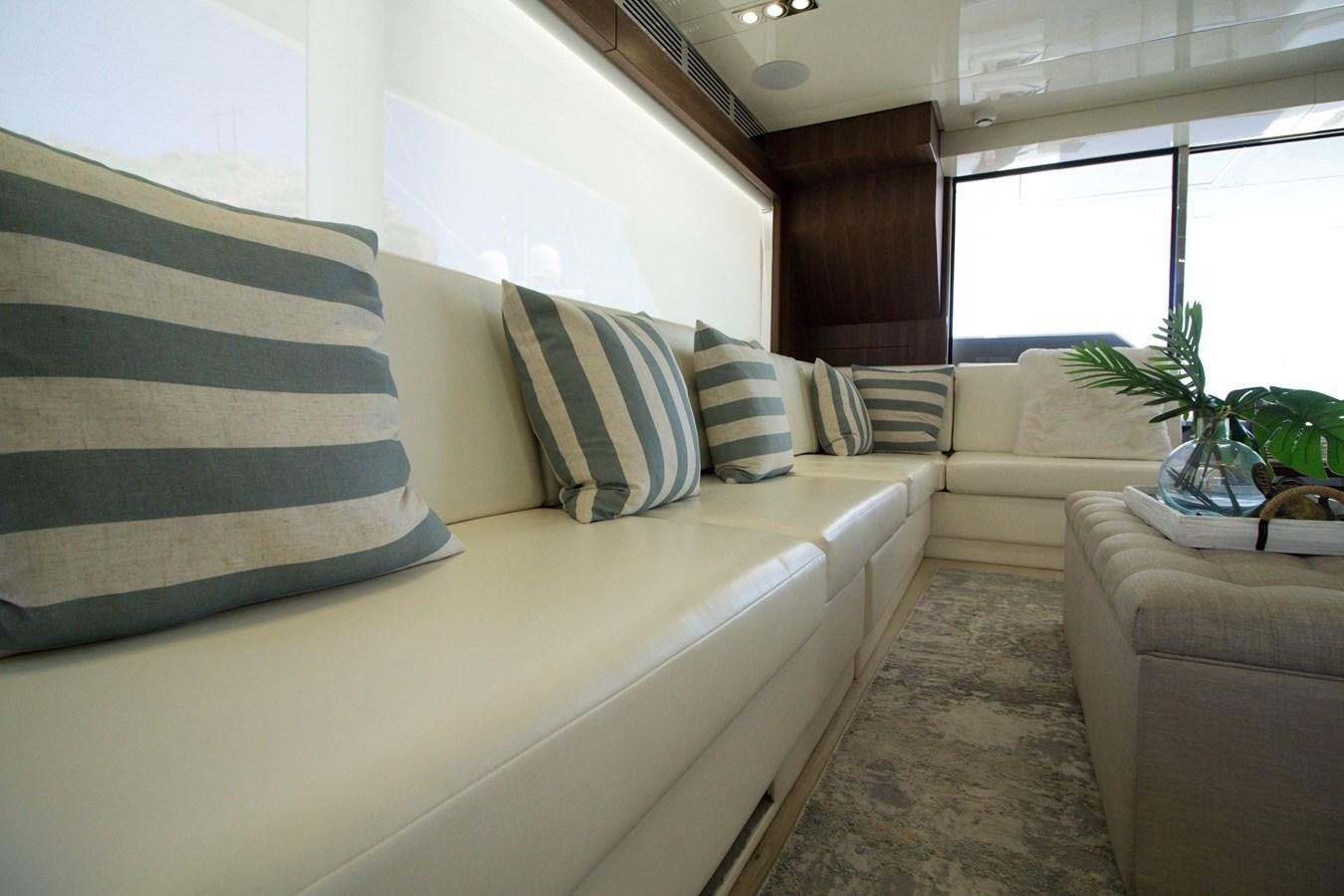 a large bed with pillows aboard SEDA Yacht for Sale
