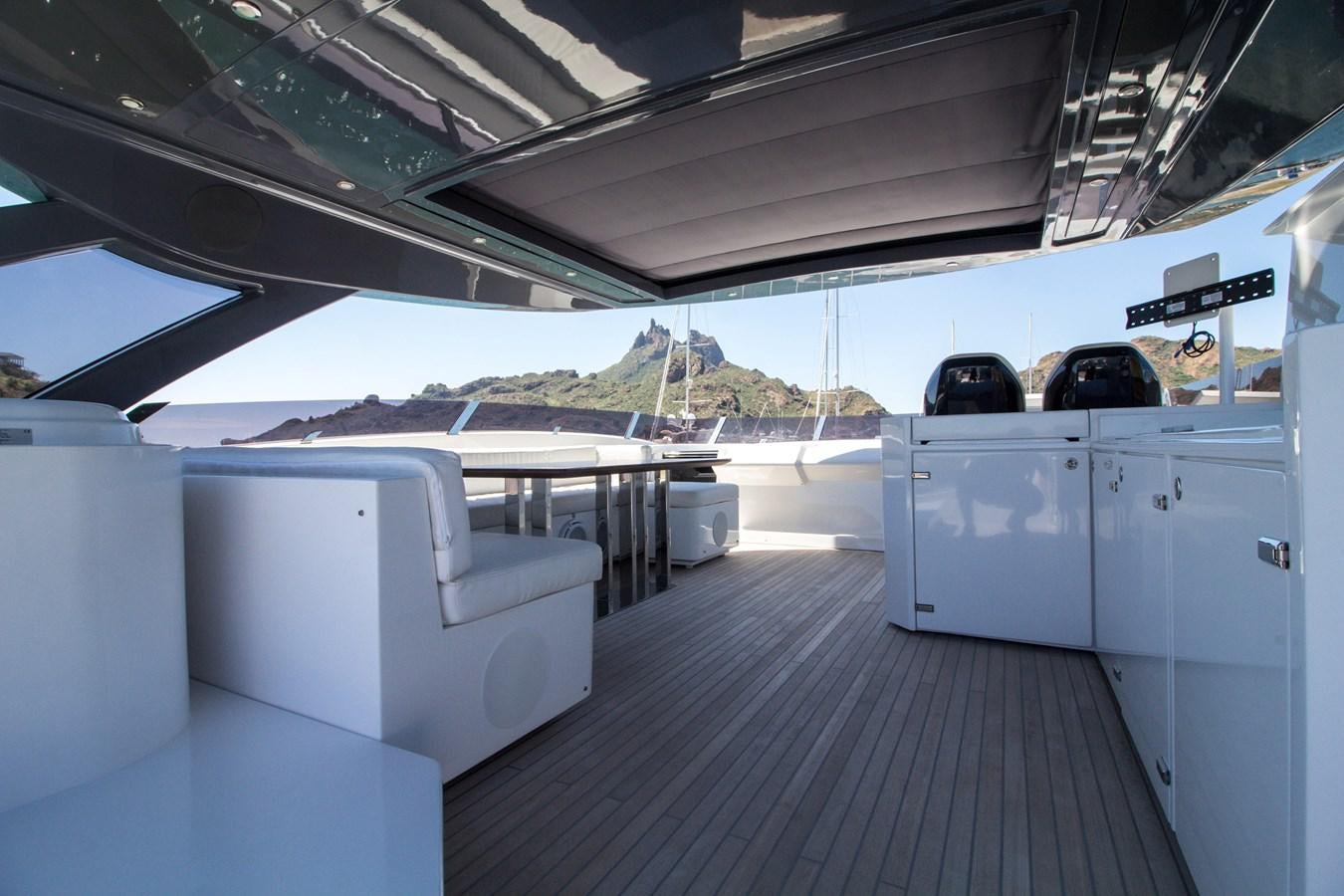 a boat dock with white containers aboard SEDA Yacht for Sale