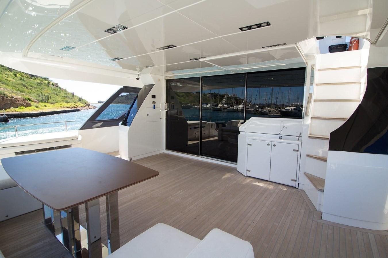 a room with a large glass door aboard SEDA Yacht for Sale