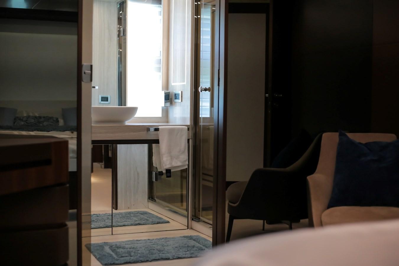 a room with a sink and a bed aboard SEDA Yacht for Sale