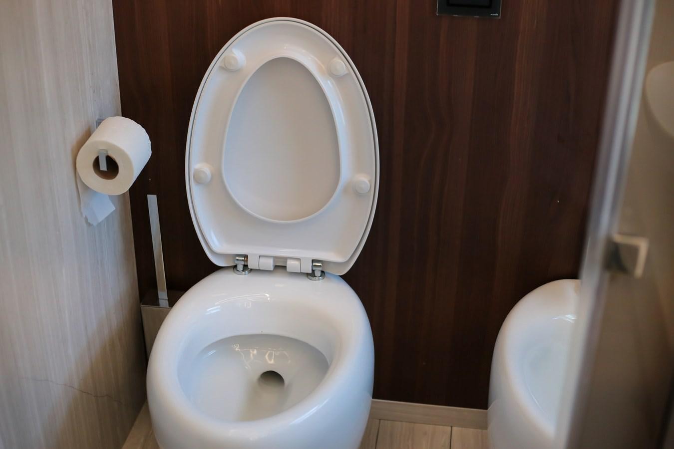a toilet with a seat up aboard SEDA Yacht for Sale