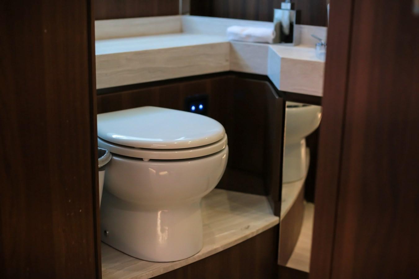a toilet in a bathroom aboard SEDA Yacht for Sale
