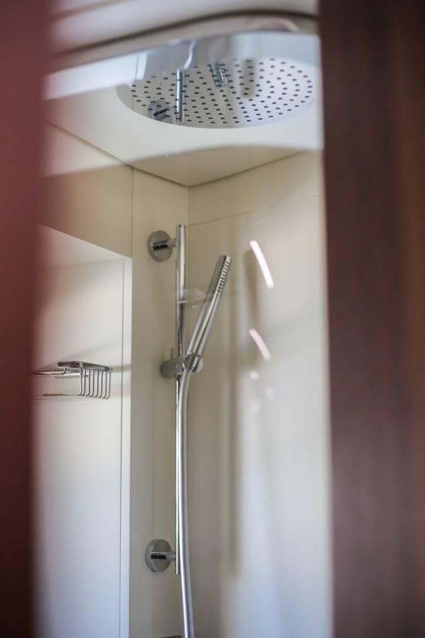 a shower with a glass door aboard SEDA Yacht for Sale