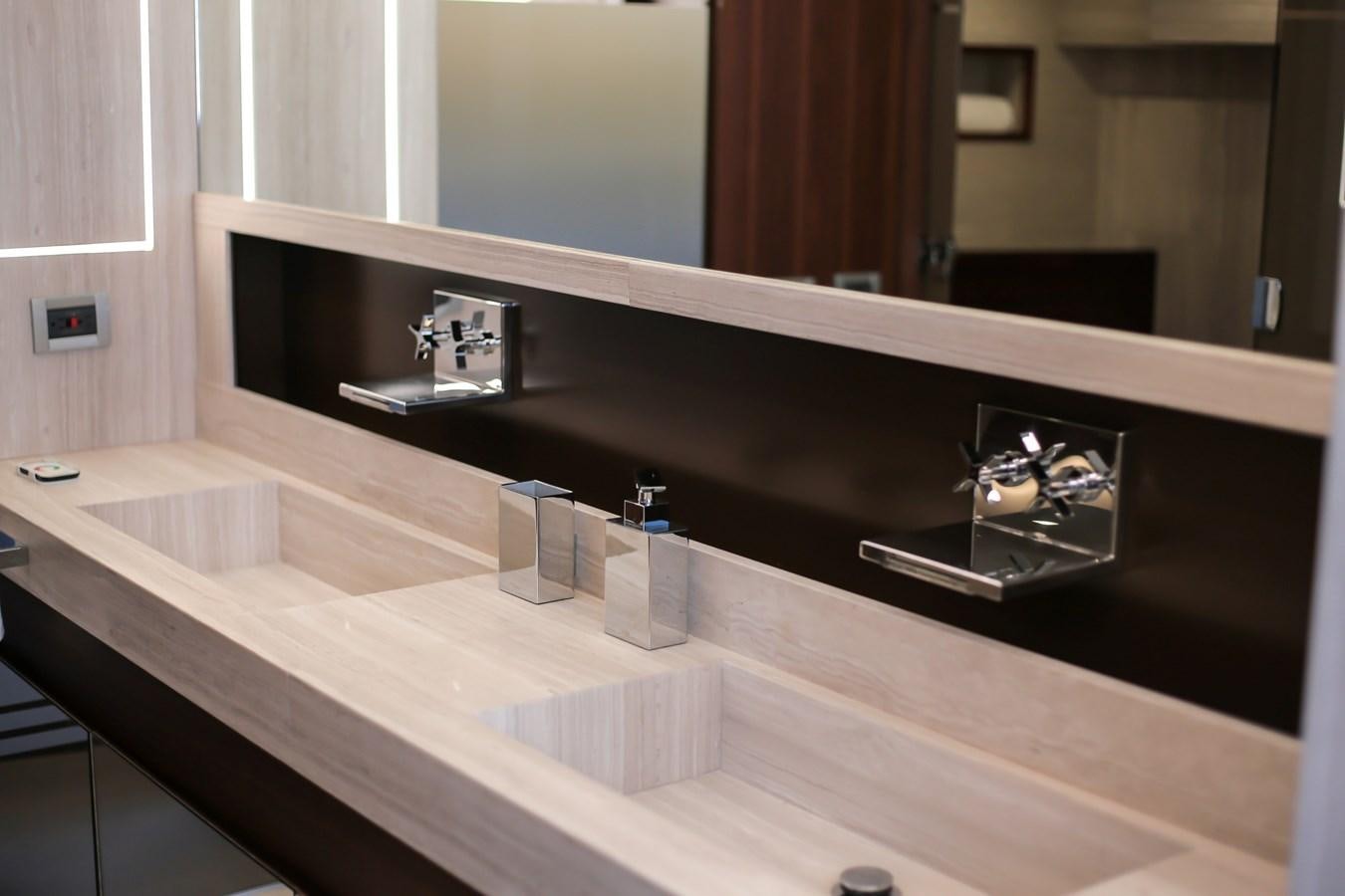 a bathroom with a large mirror aboard SEDA Yacht for Sale