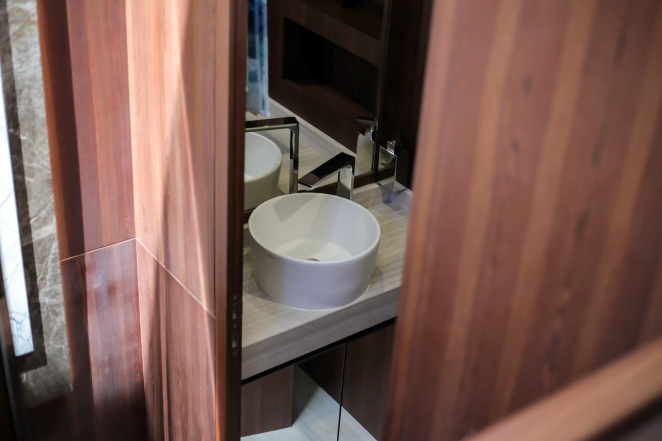 a bathroom with a sink and a toilet aboard SEDA Yacht for Sale