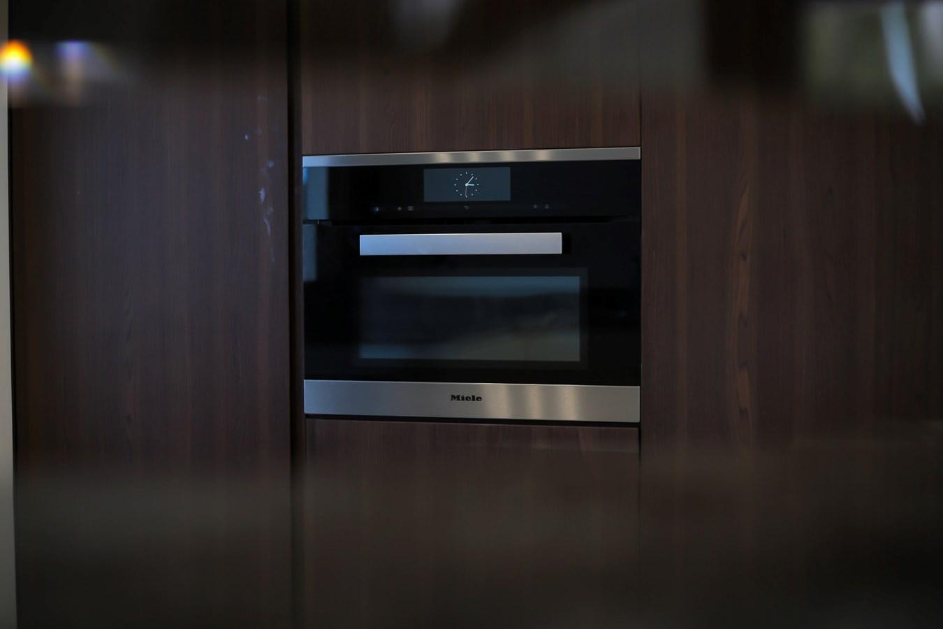 a microwave oven on a counter aboard SEDA Yacht for Sale