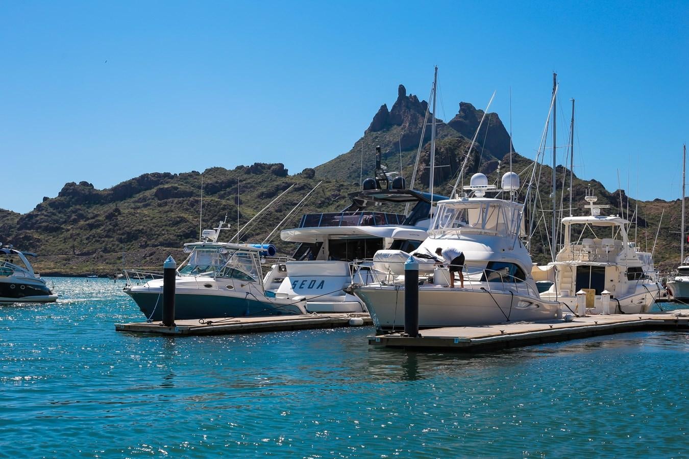 boats are parked in the water aboard SEDA Yacht for Sale