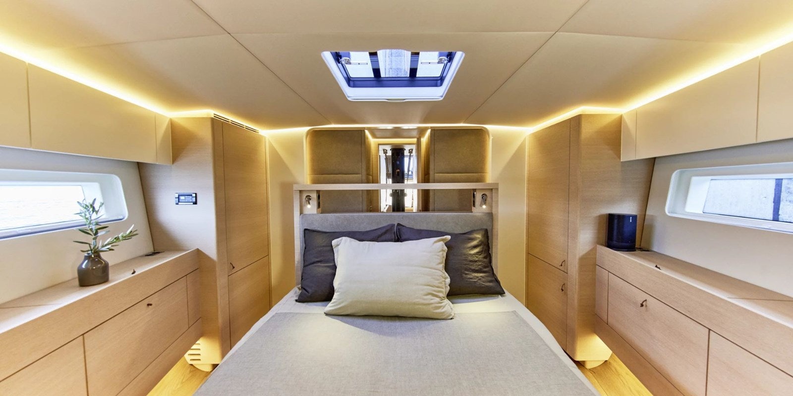 a bed with pillows aboard W Yacht for Sale