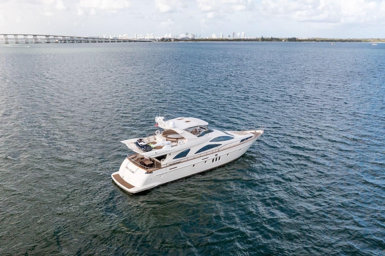 a white boat in the water aboard AZIMUT 80 2003 Yacht for Sale