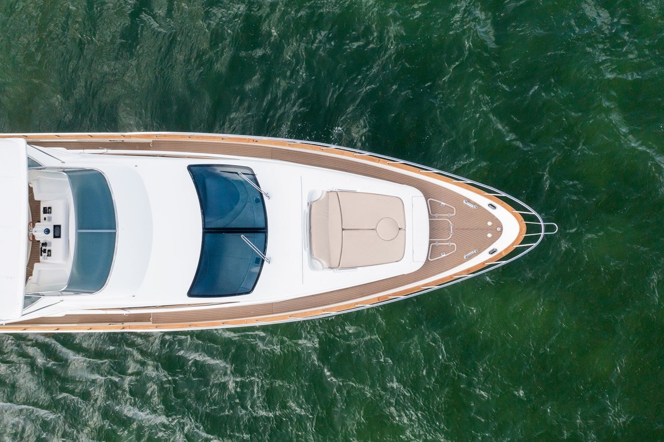 a small white boat aboard AZIMUT 80 2003 Yacht for Sale