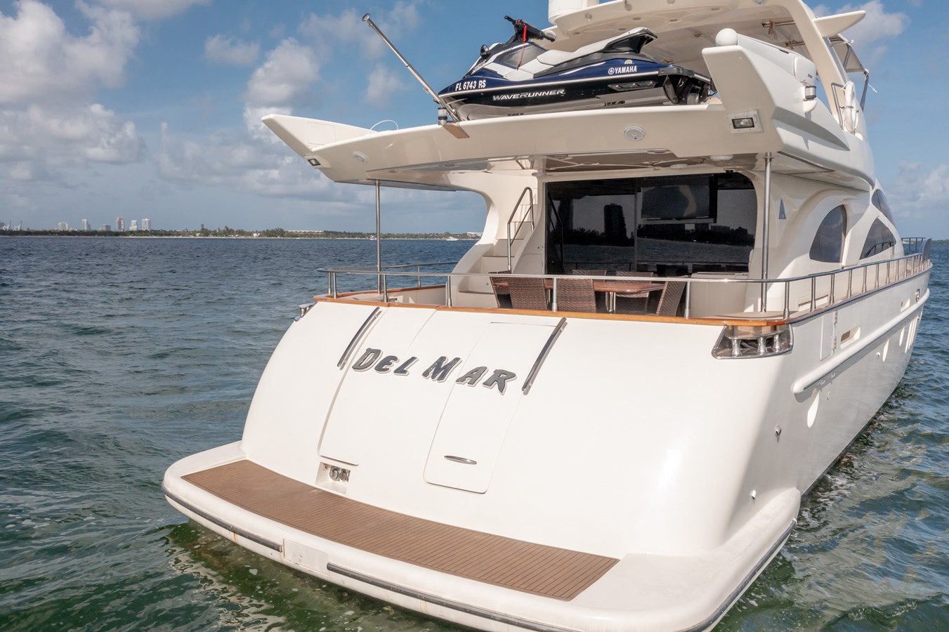 a white boat on the water aboard AZIMUT 80 2003 Yacht for Sale