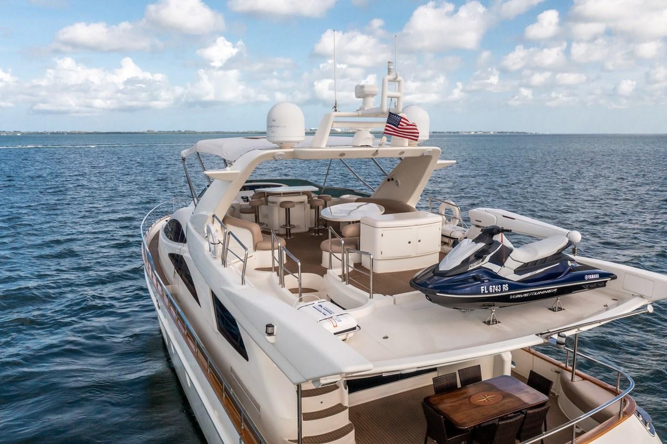 a boat on the water aboard AZIMUT 80 2003 Yacht for Sale