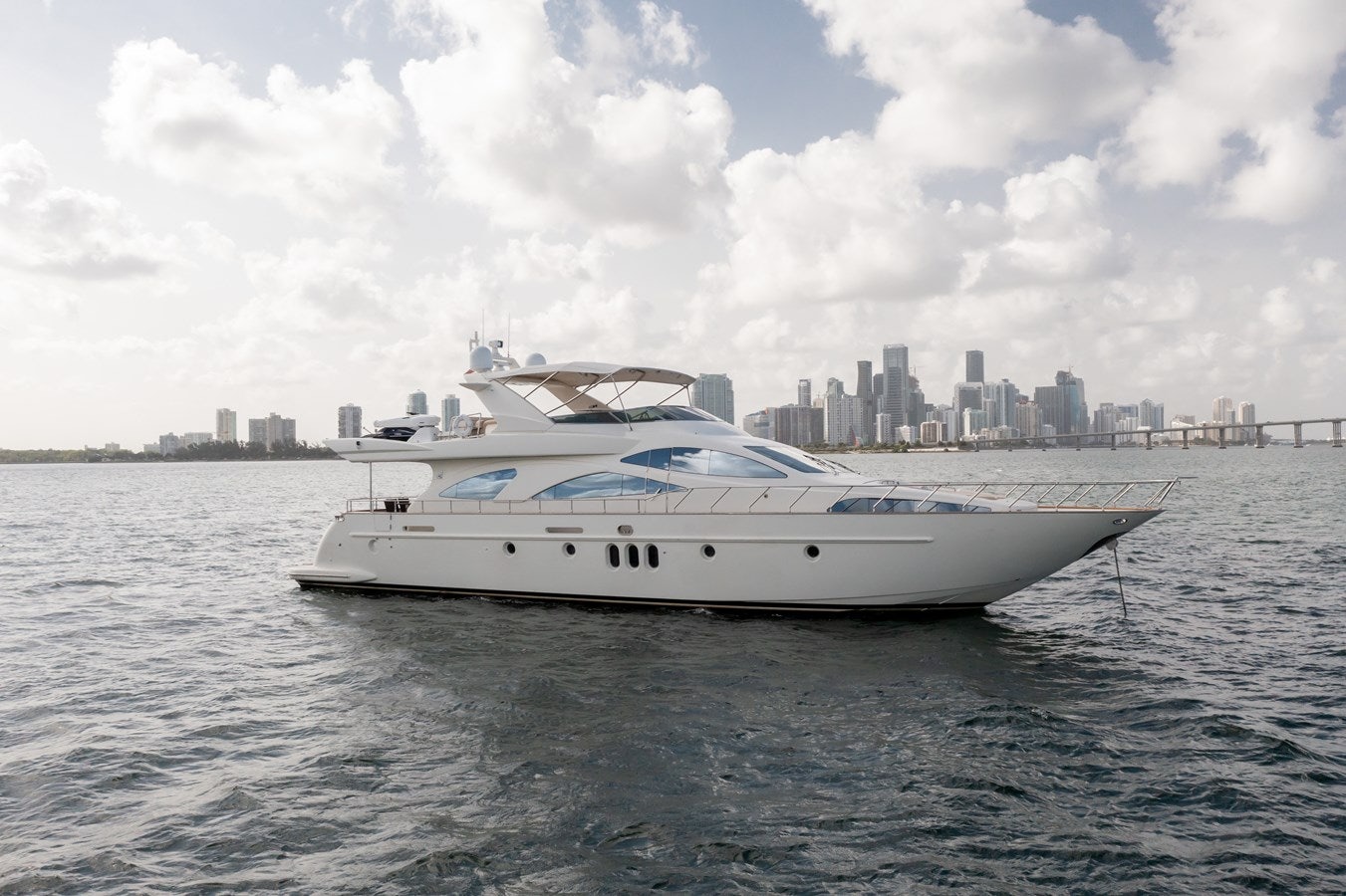 a yacht on the water aboard AZIMUT 80 2003 Yacht for Sale