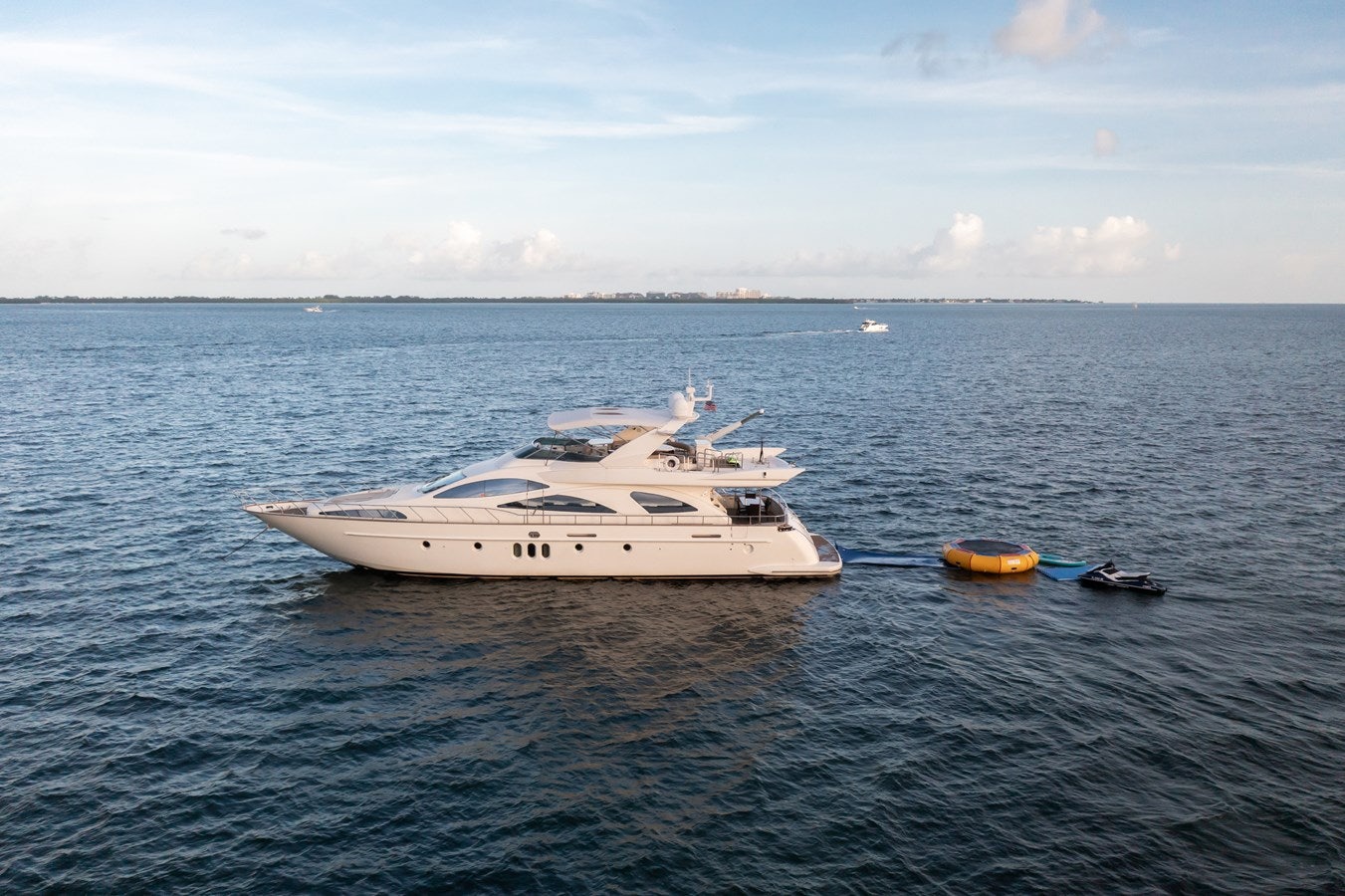 a white yacht in the water aboard AZIMUT 80 2003 Yacht for Sale