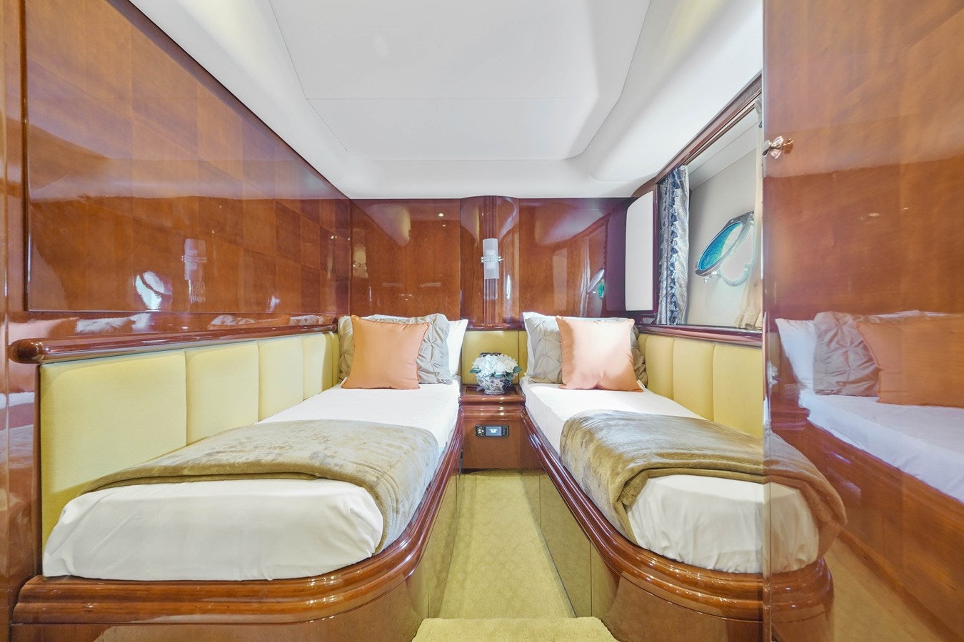 a room with a couple of beds aboard AZIMUT 80 2003 Yacht for Sale