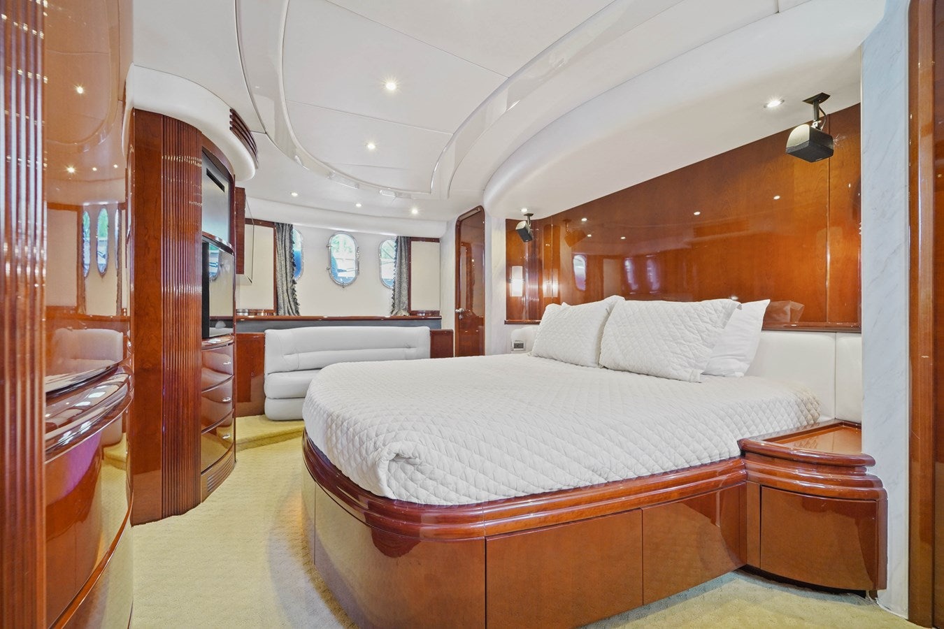 a large bedroom with a bed aboard AZIMUT 80 2003 Yacht for Sale