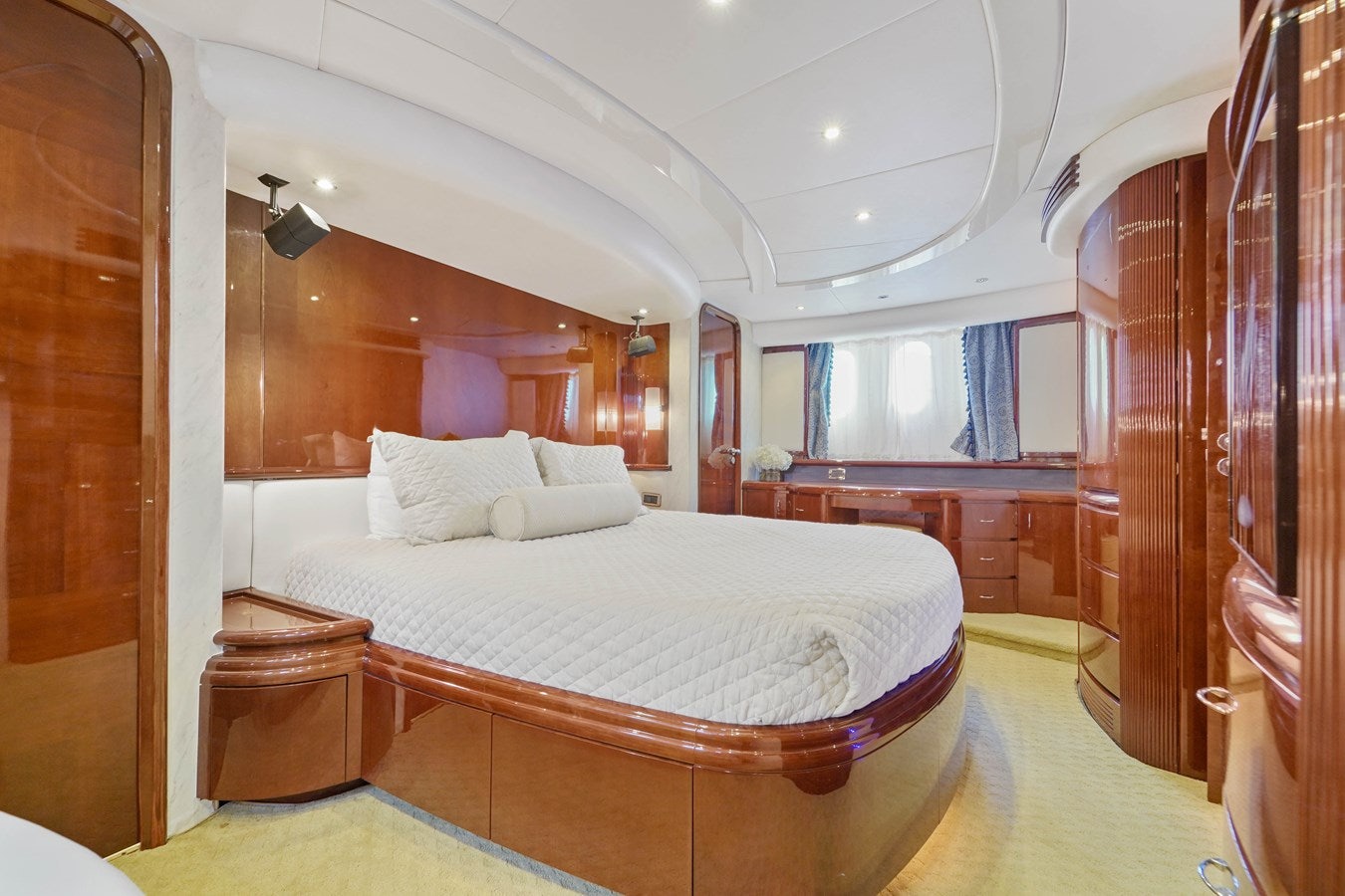 a bed in a room aboard AZIMUT 80 2003 Yacht for Sale