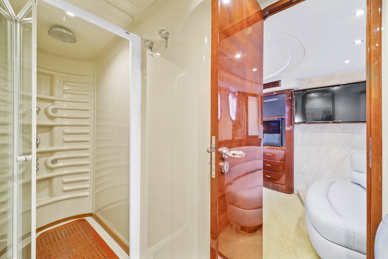 a bathroom with a shower unit and a toilet aboard AZIMUT 80 2003 Yacht for Sale