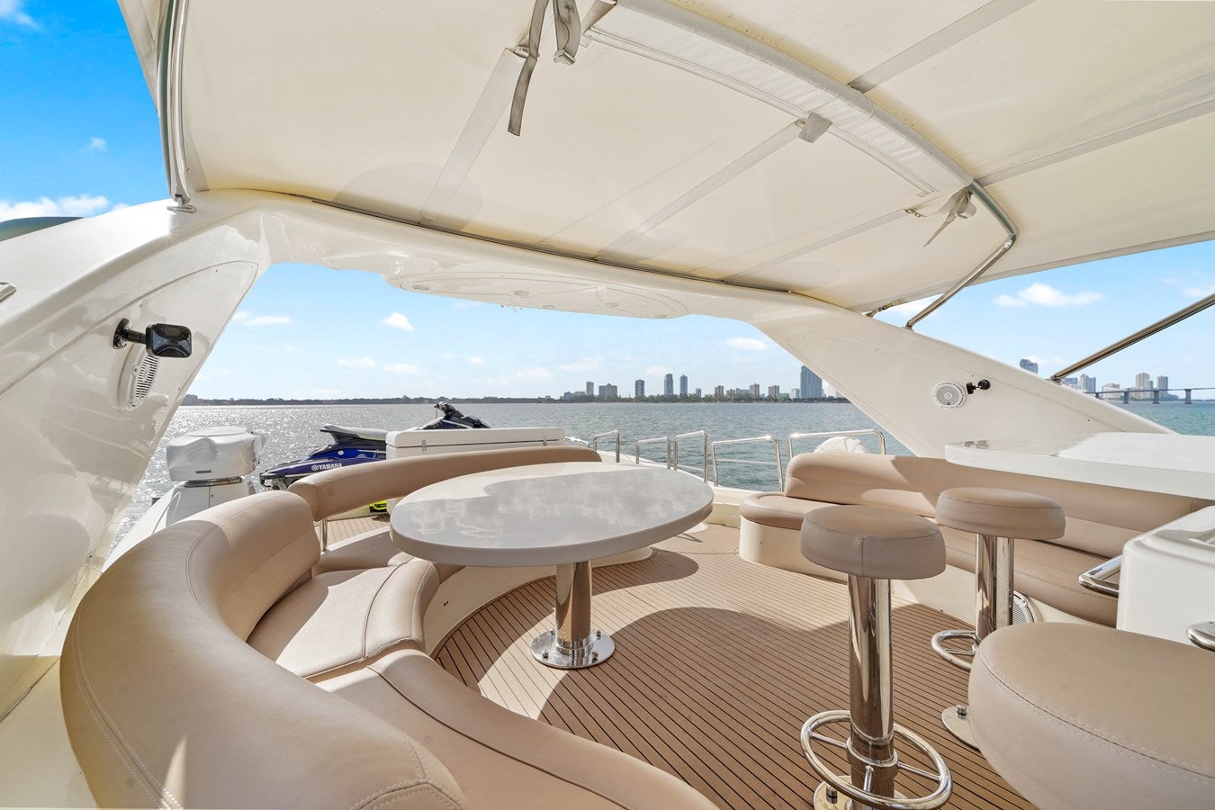 a tent with a table and chairs aboard AZIMUT 80 2003 Yacht for Sale