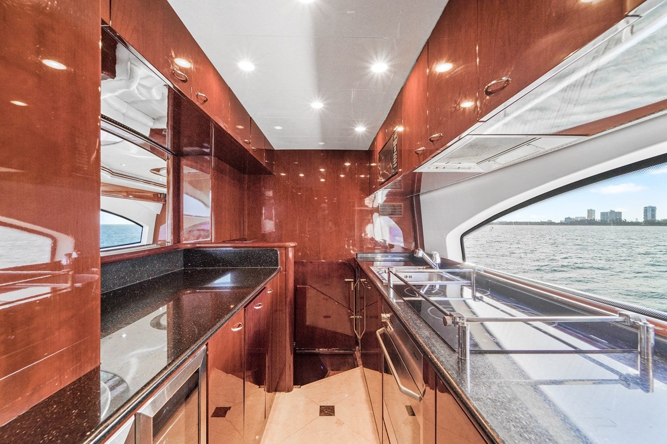 a kitchen with a large oven aboard AZIMUT 80 2003 Yacht for Sale