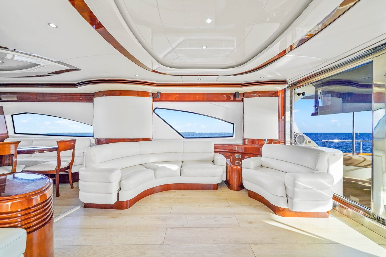a room with a bed and a couch aboard AZIMUT 80 2003 Yacht for Sale