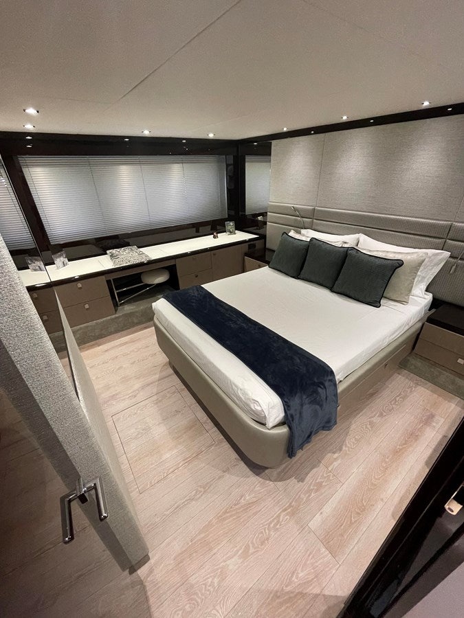 a bed in a room aboard 66 MANHATTAN Yacht for Sale