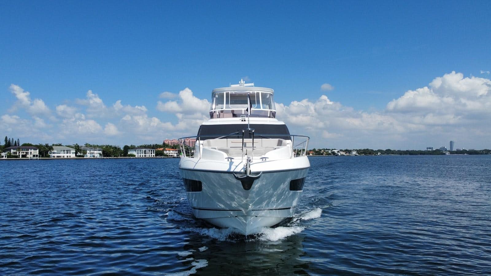 a large white boat in the water aboard 66 MANHATTAN Yacht for Sale