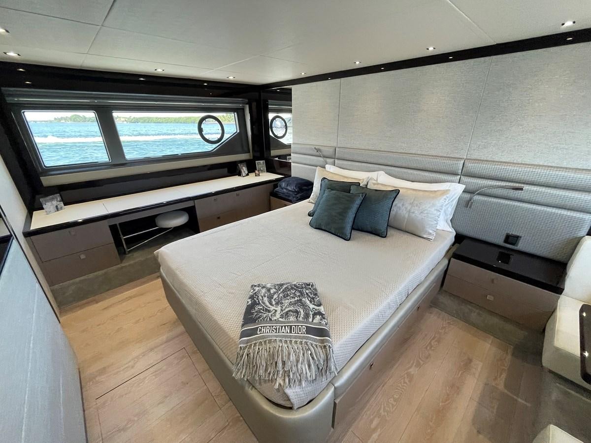 a bed in a room aboard 66 MANHATTAN Yacht for Sale