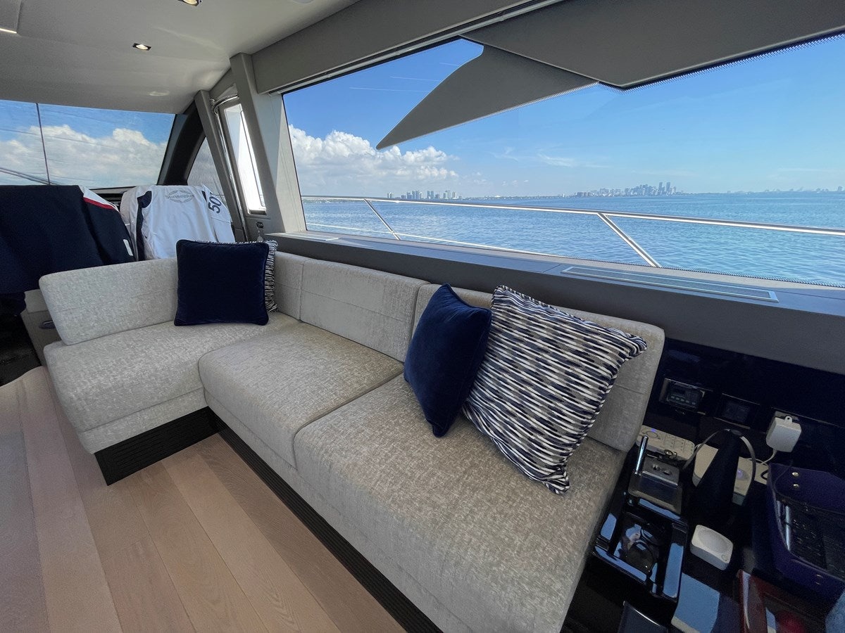 a large living room with a large ocean view aboard 66 MANHATTAN Yacht for Sale