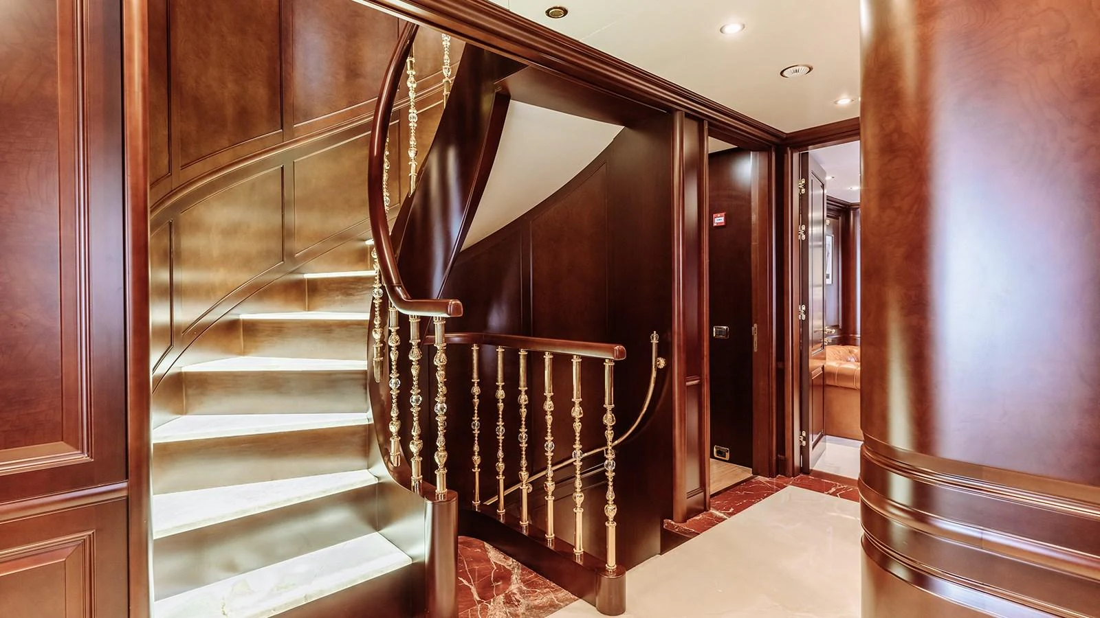 a staircase in a building aboard INCAL Yacht for Sale