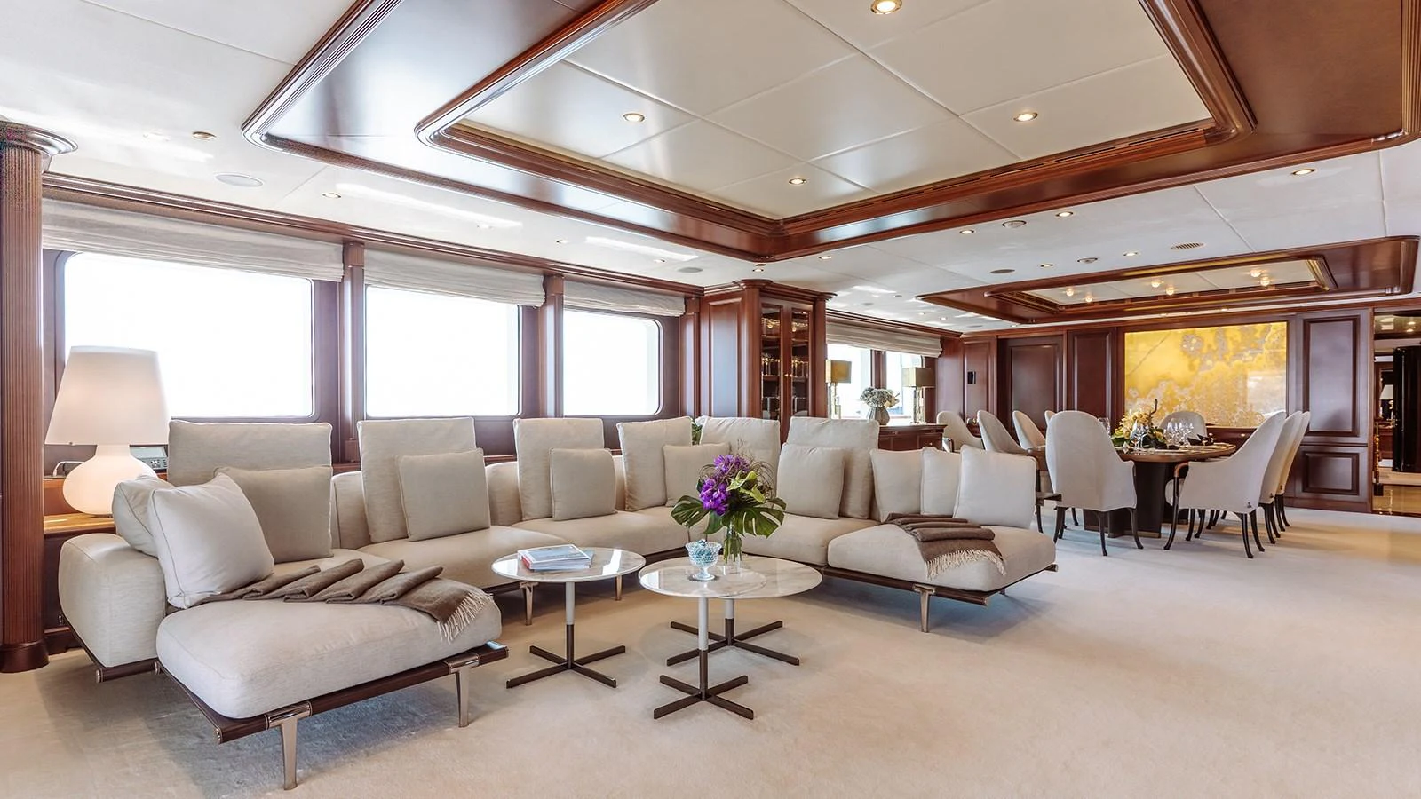 a living room with a couch and a table aboard INCAL Yacht for Sale