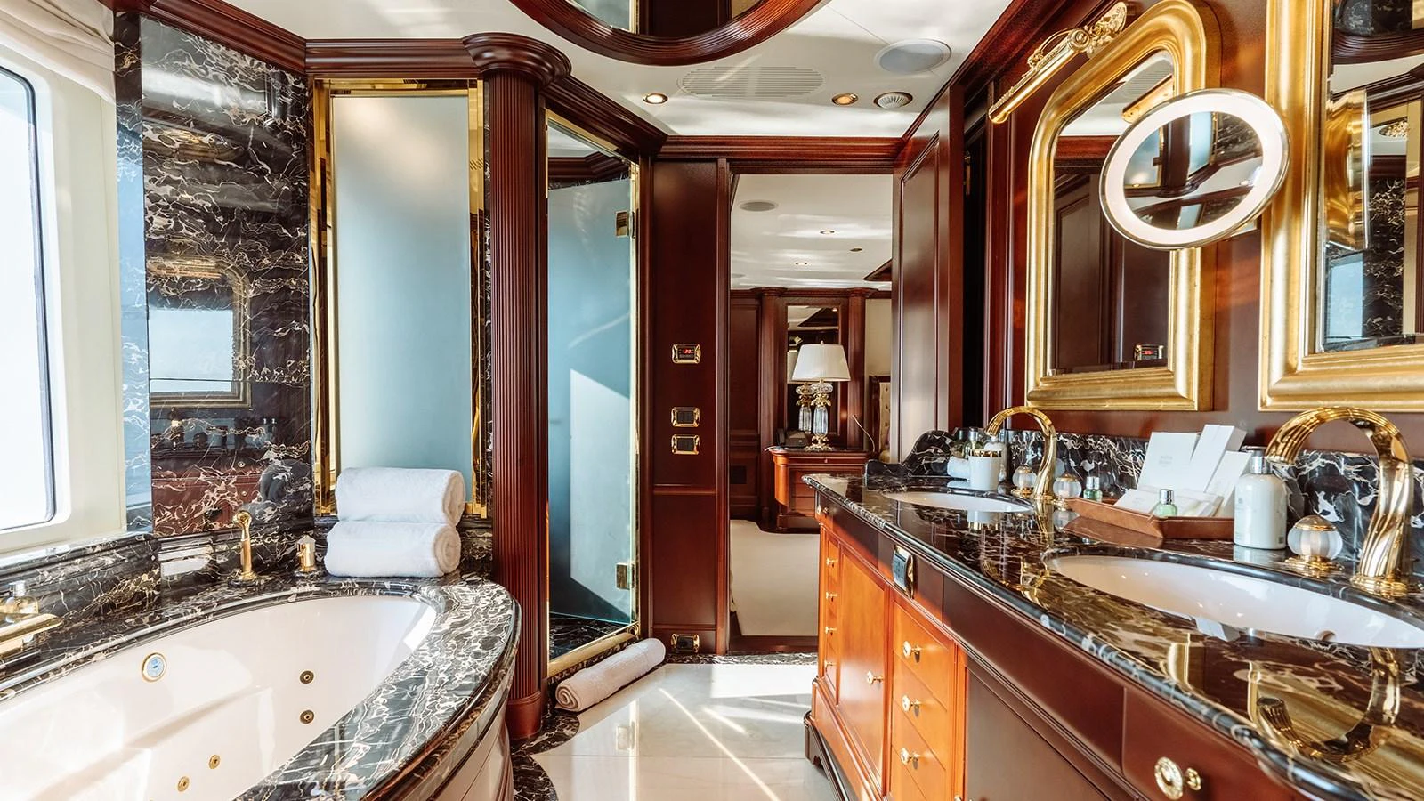 a bathroom with a large bathtub aboard INCAL Yacht for Sale