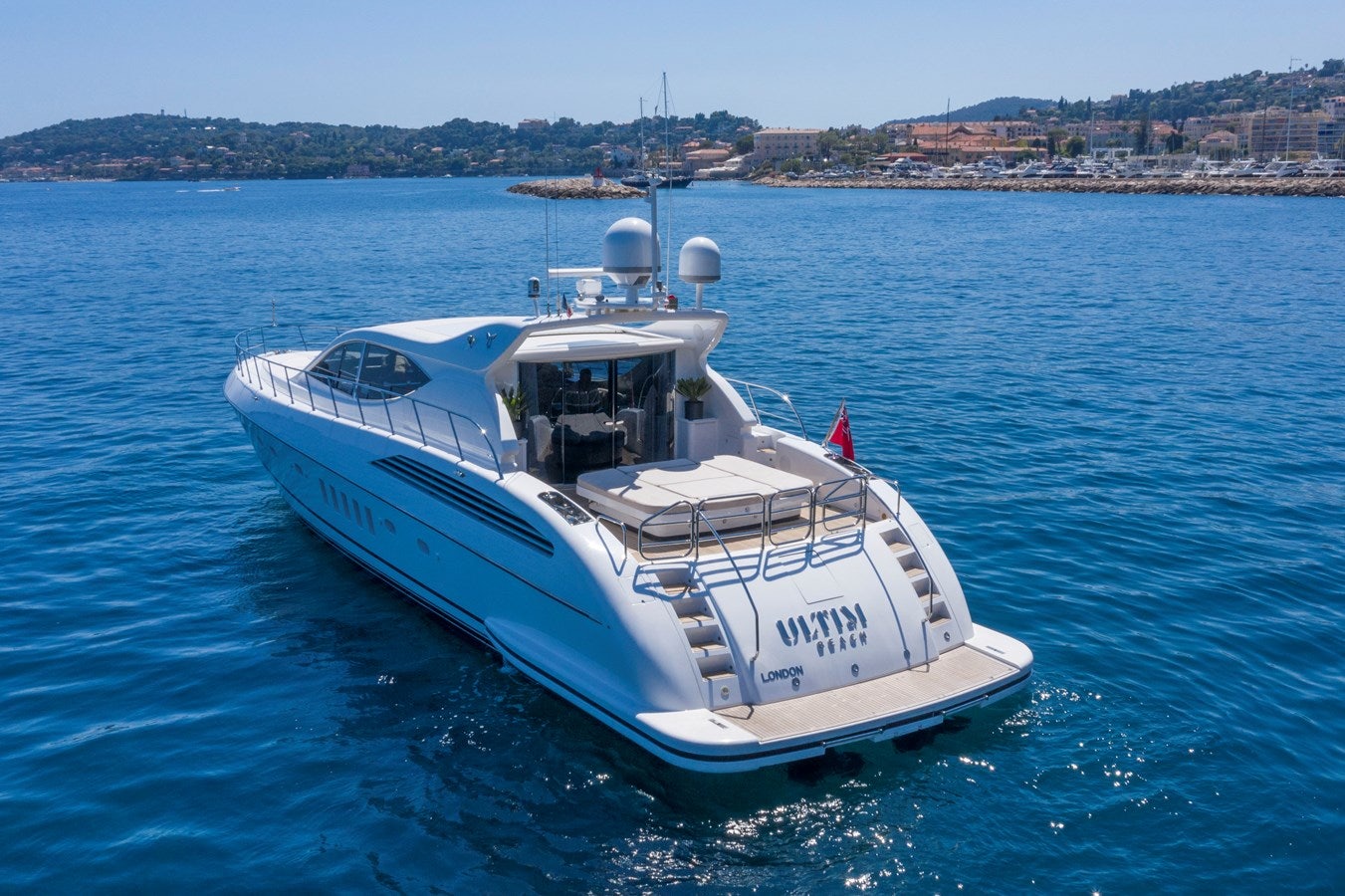 a boat in the water aboard ULTIMA BEACH Yacht for Sale