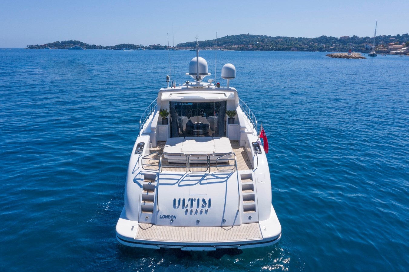 a boat on the water aboard ULTIMA BEACH Yacht for Sale