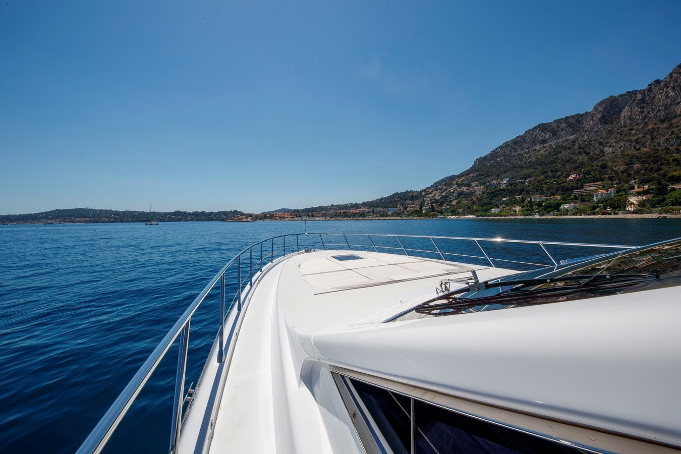 a boat on the water aboard ULTIMA BEACH Yacht for Sale