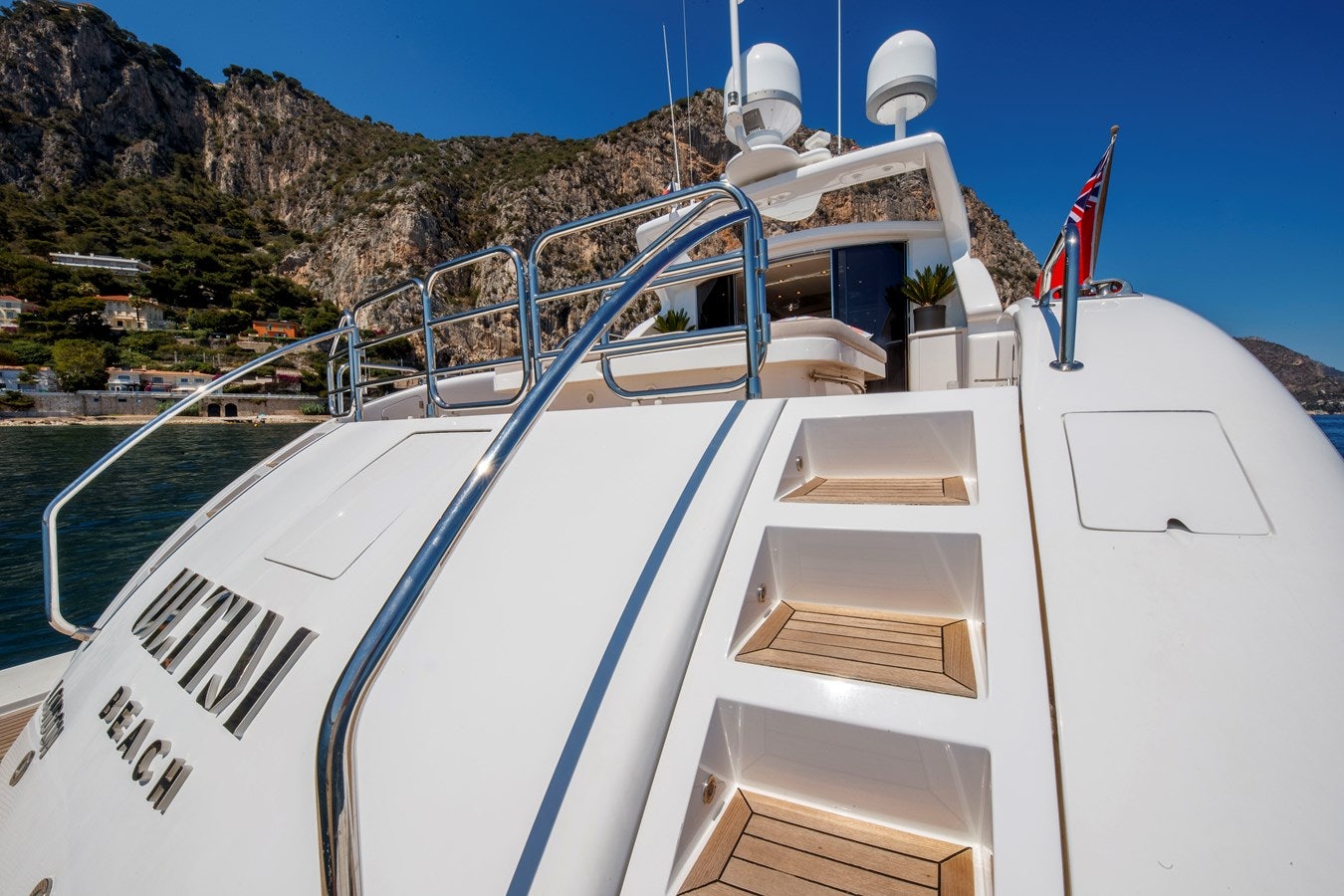 a boat on the water aboard ULTIMA BEACH Yacht for Sale