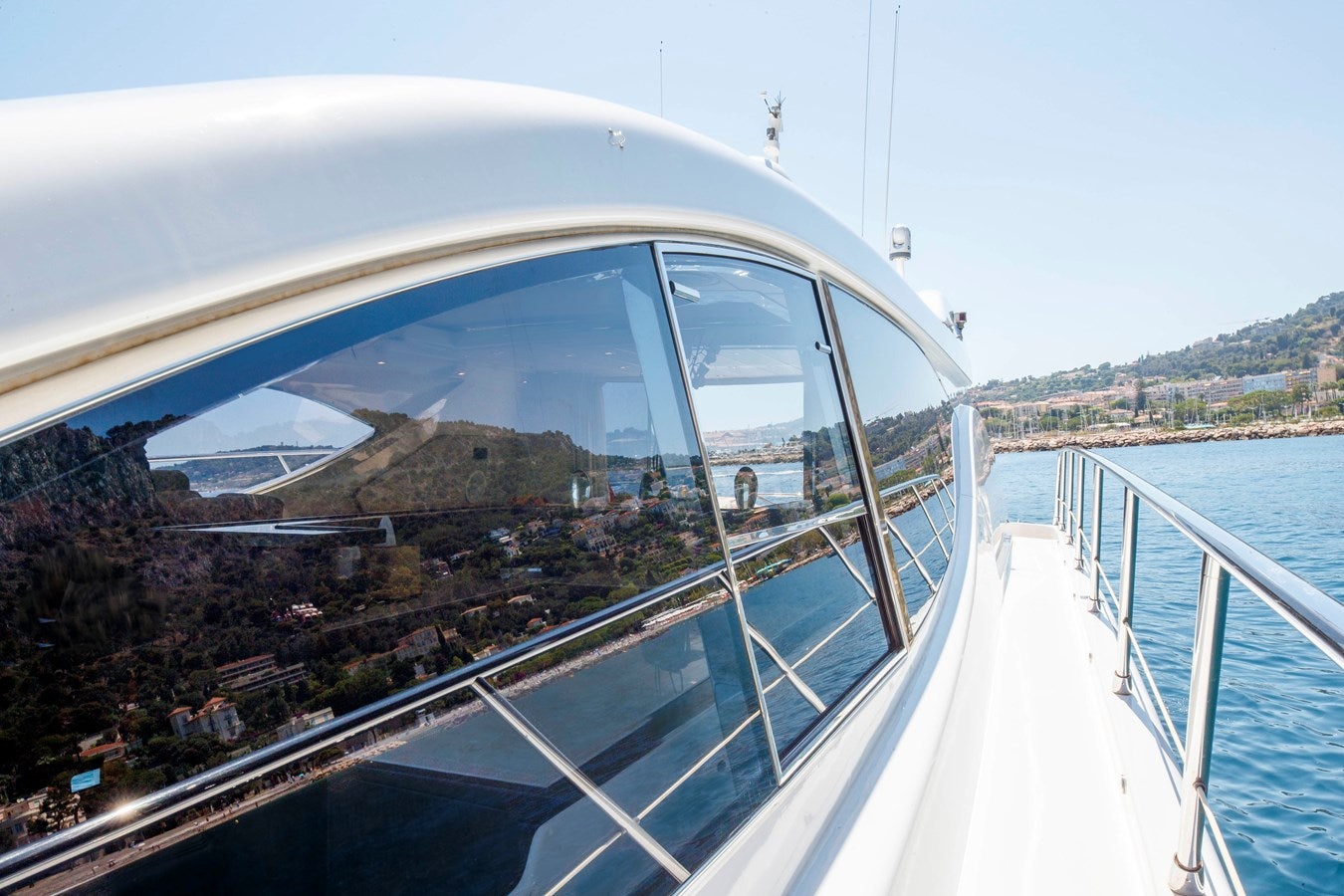 a large white bridge over water aboard ULTIMA BEACH Yacht for Sale