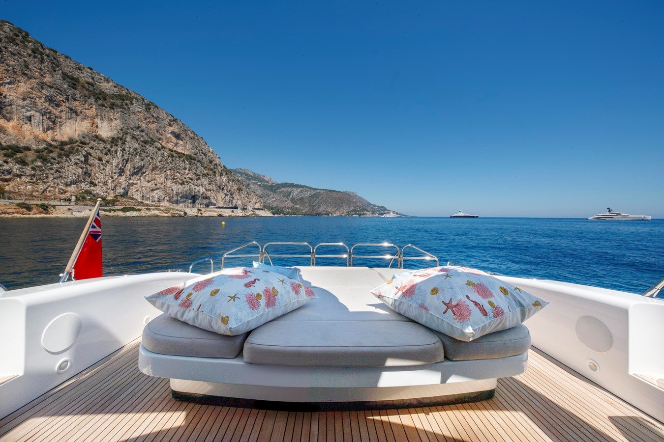 a cake on a plate on a boat aboard ULTIMA BEACH Yacht for Sale